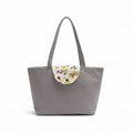 Gray tote bag with floral detail on a white background
