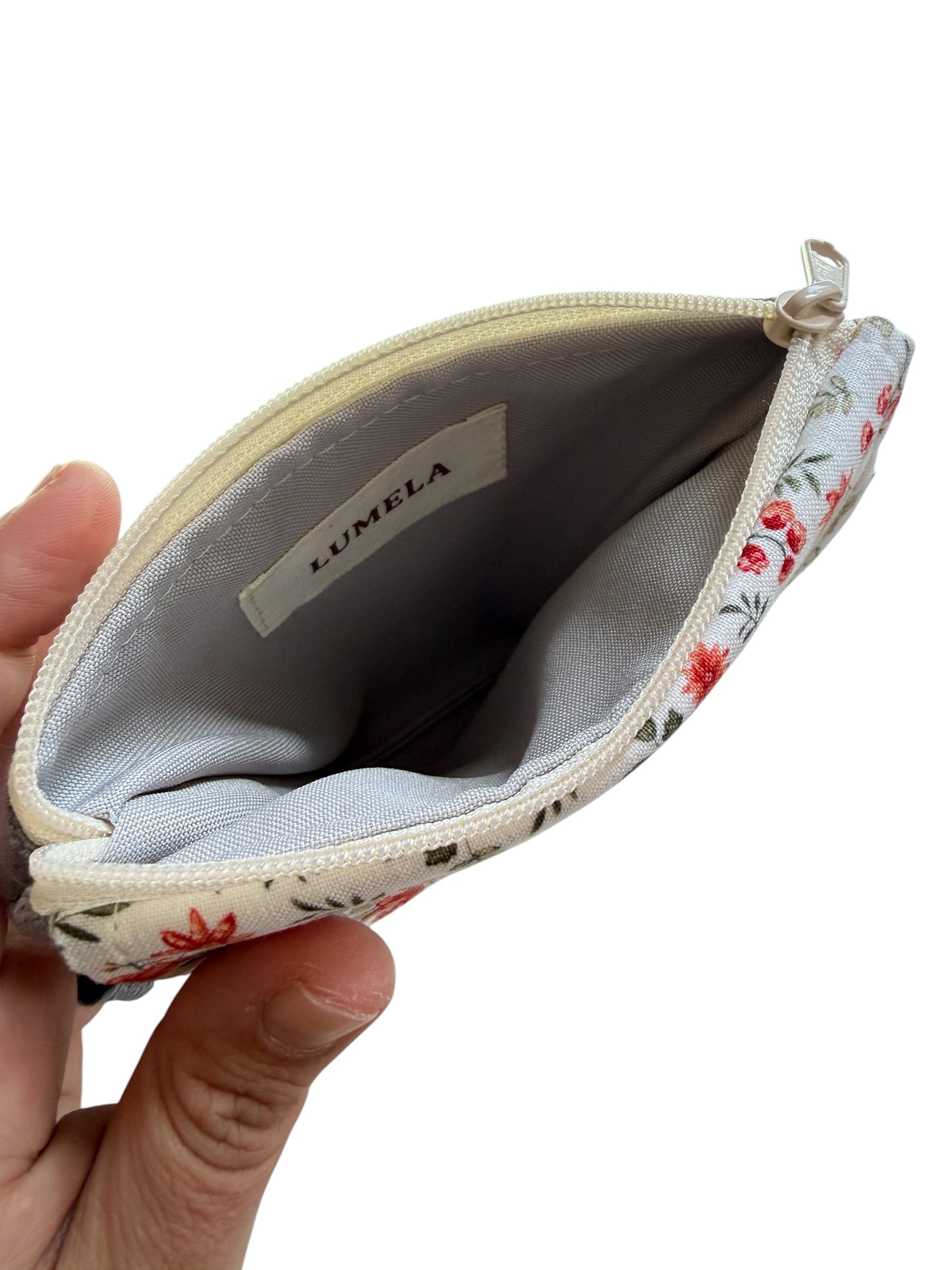 Inside of Florence gray floral keychain wallet showing compartments