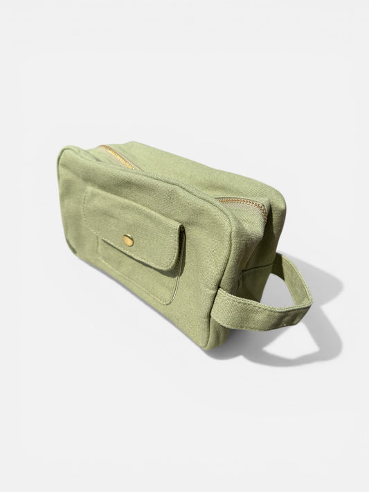 Olive green canvas makeup bag side view minimalist toiletry pouch