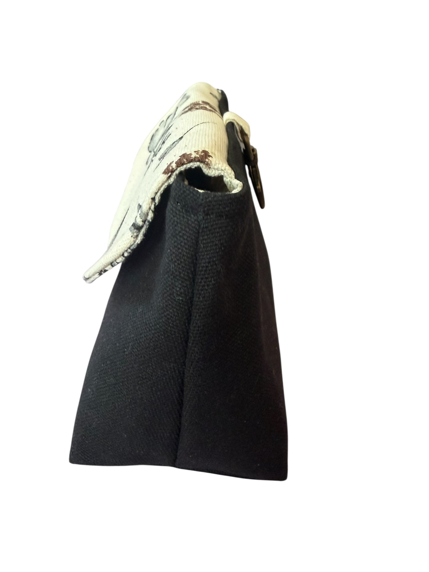 Side view of meadow canvas clip-on pouch showing shape