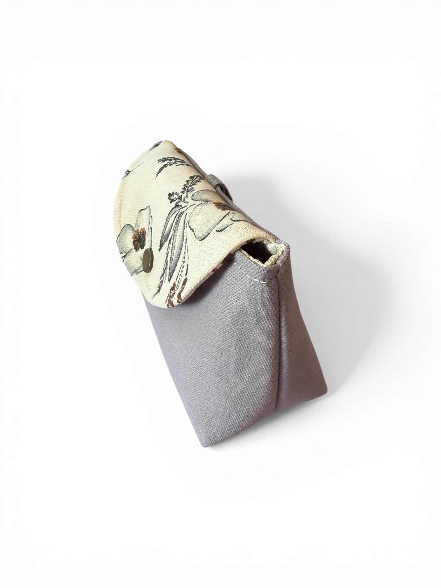 Side view of gray meadow canvas clip-on pouch showing shape