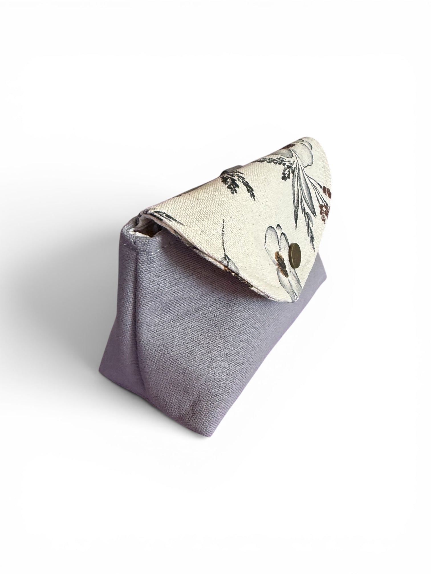 Side view of gray meadow canvas clip-on pouch showing shape