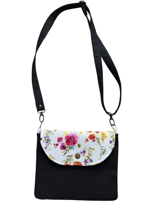 Black Floral canvas tote bag in soft spring tones on white background